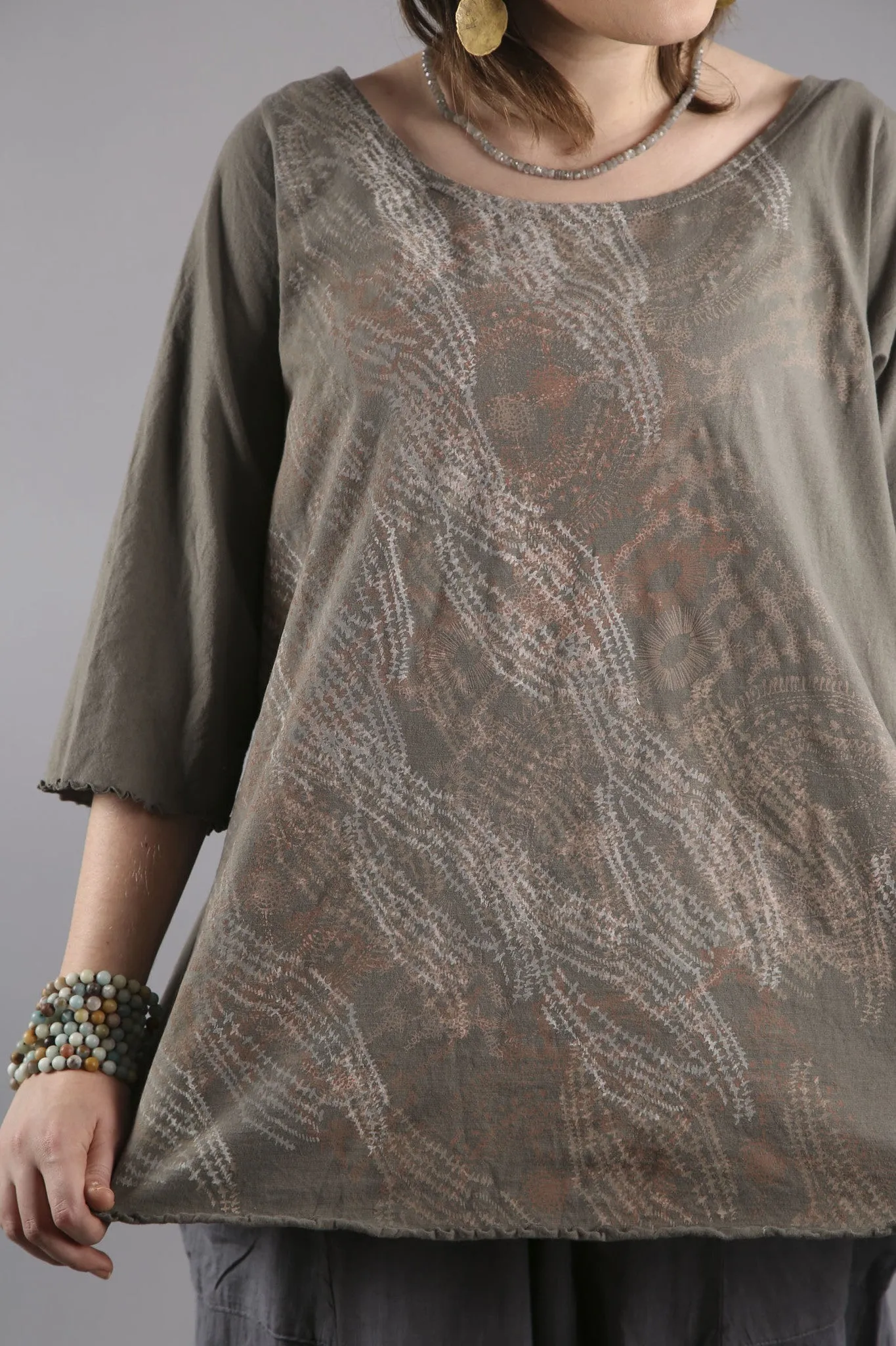 Cafe Tee Sage  with stitched lines in subtle tones print.