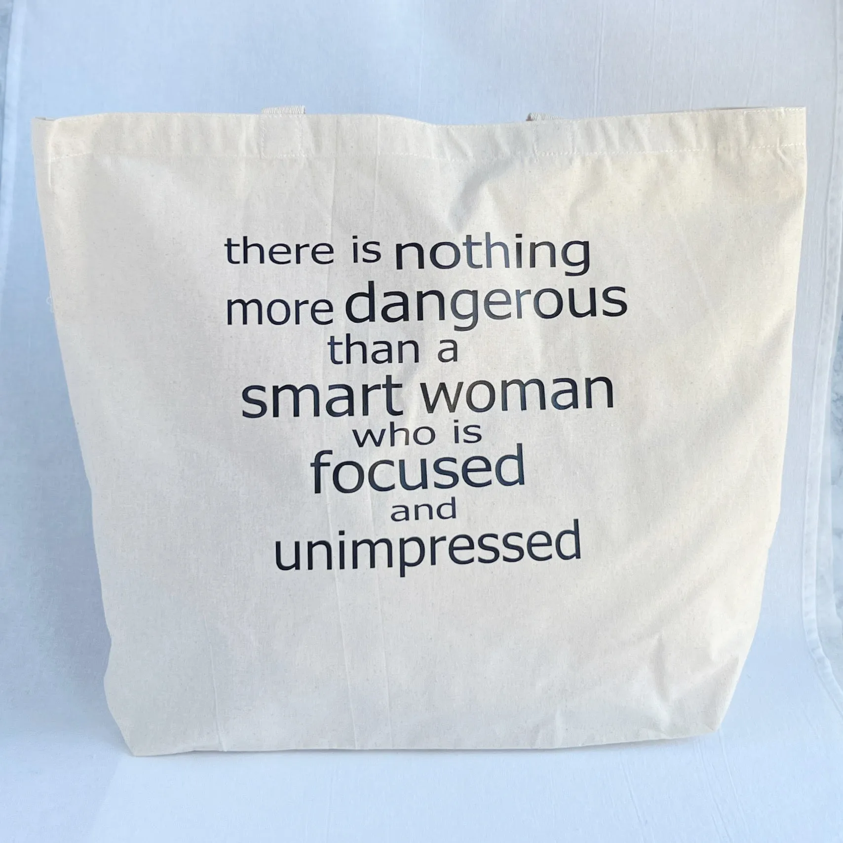 Focused and Unimpressed Women tote bag