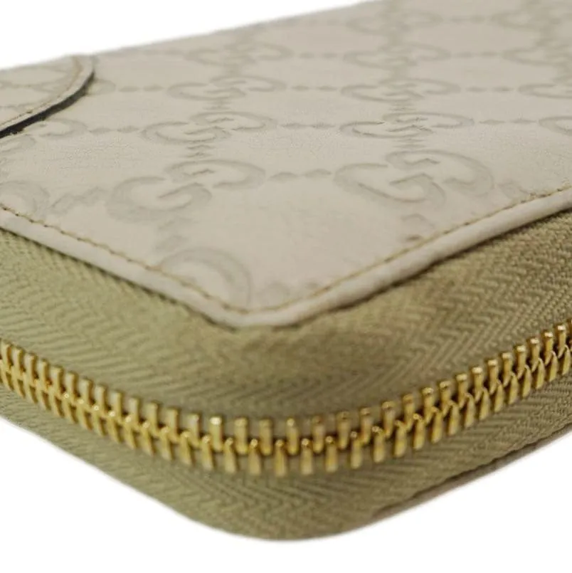 GUCCI GG Canvas Zippy Wallet White 323397