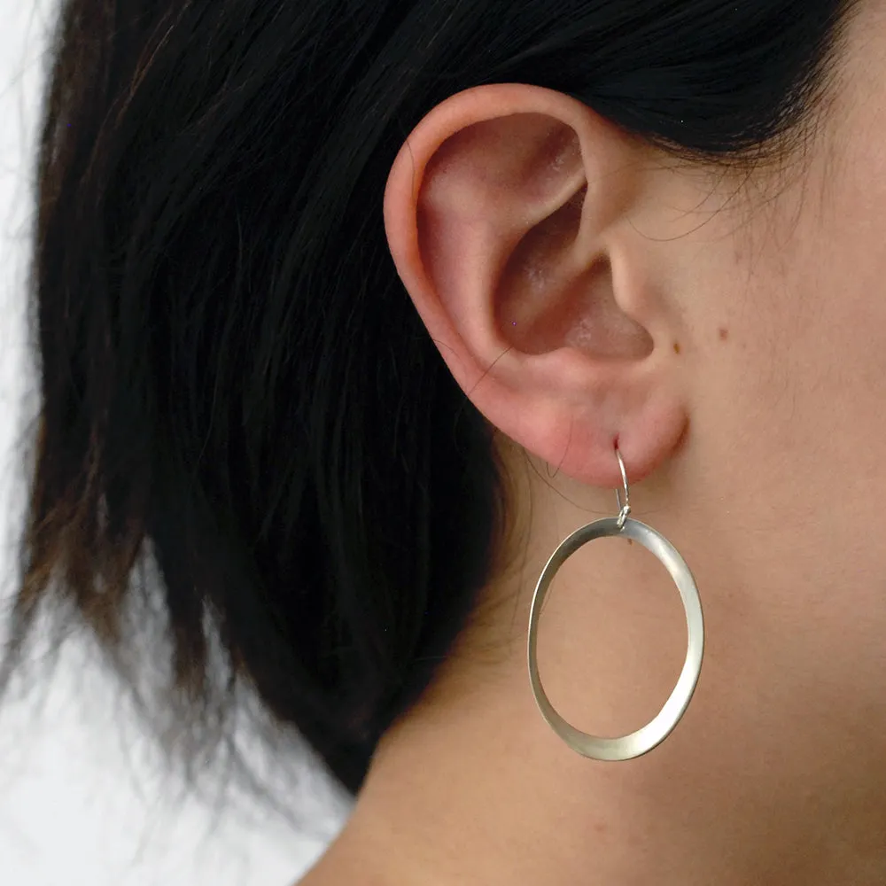 large rounded oculus earrings