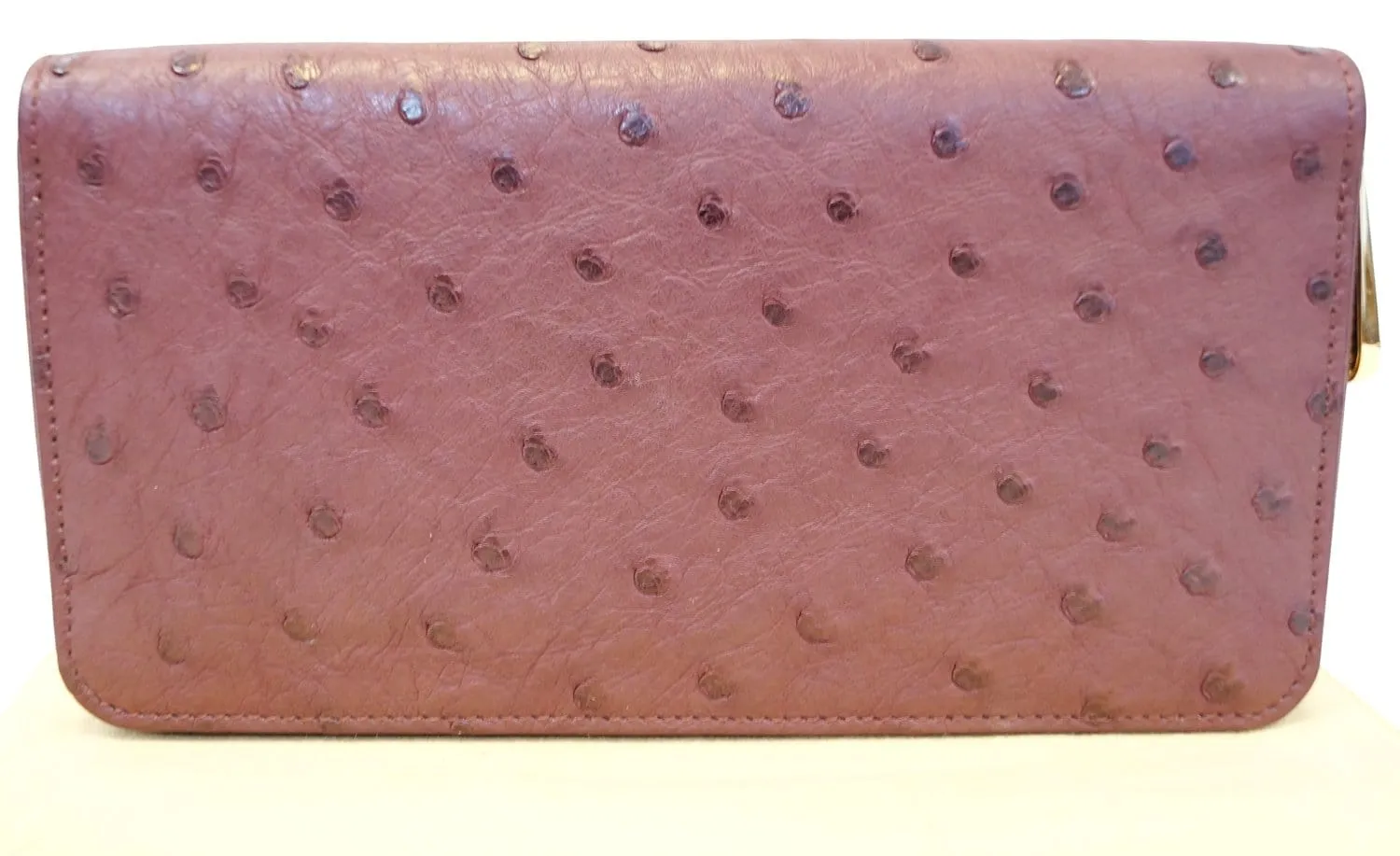 LOUIS VUITTON Burgundy Ostrich Leather Zippy Wallet - Sale