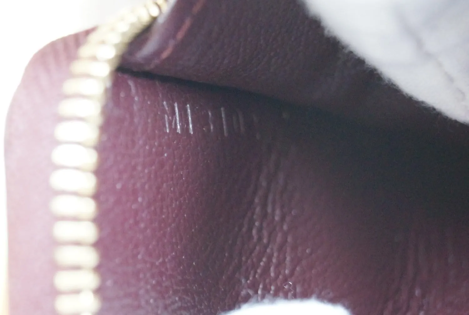 LOUIS VUITTON Burgundy Ostrich Leather Zippy Wallet - Sale