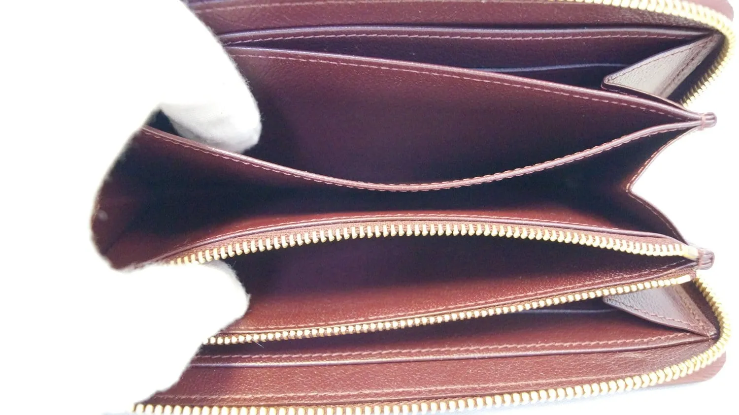 LOUIS VUITTON Burgundy Ostrich Leather Zippy Wallet - Sale