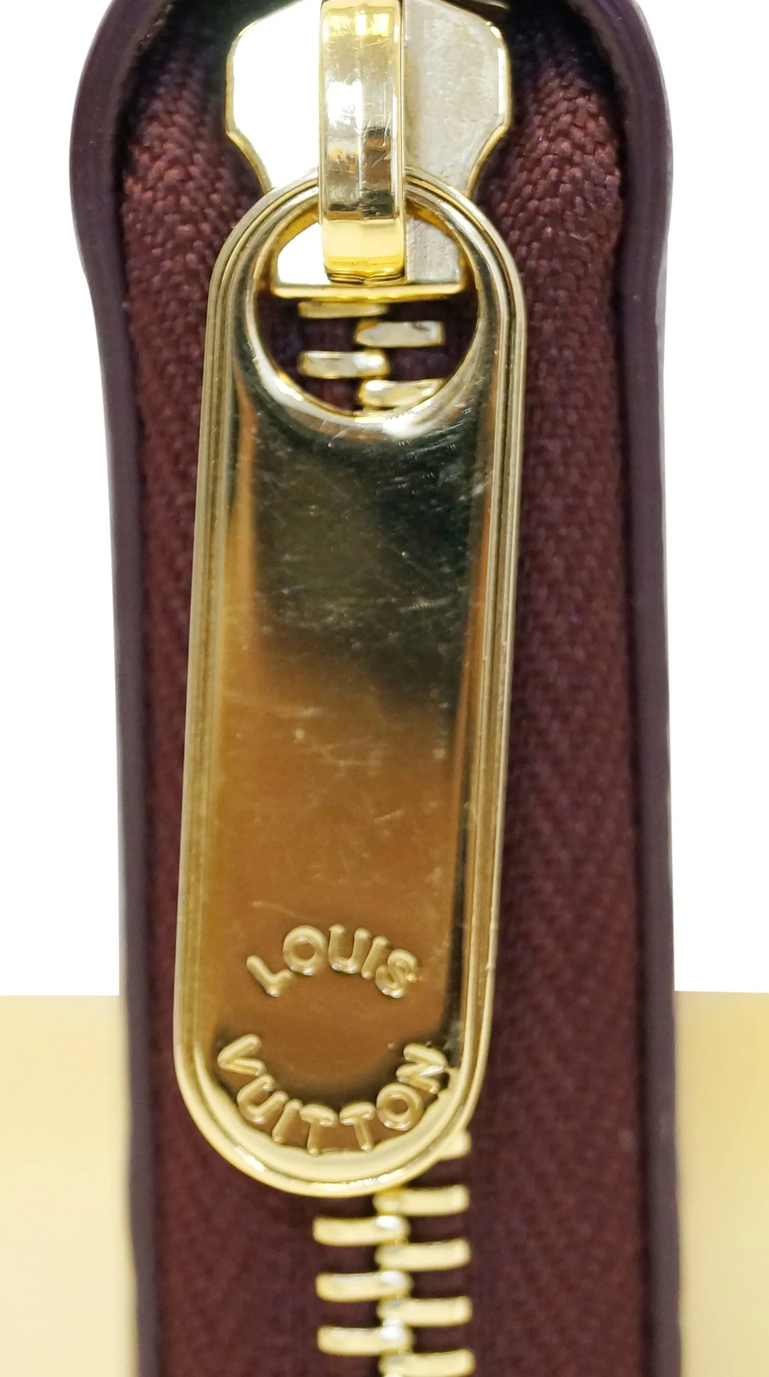 LOUIS VUITTON Burgundy Ostrich Leather Zippy Wallet - Sale