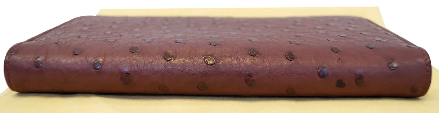 LOUIS VUITTON Burgundy Ostrich Leather Zippy Wallet - Sale