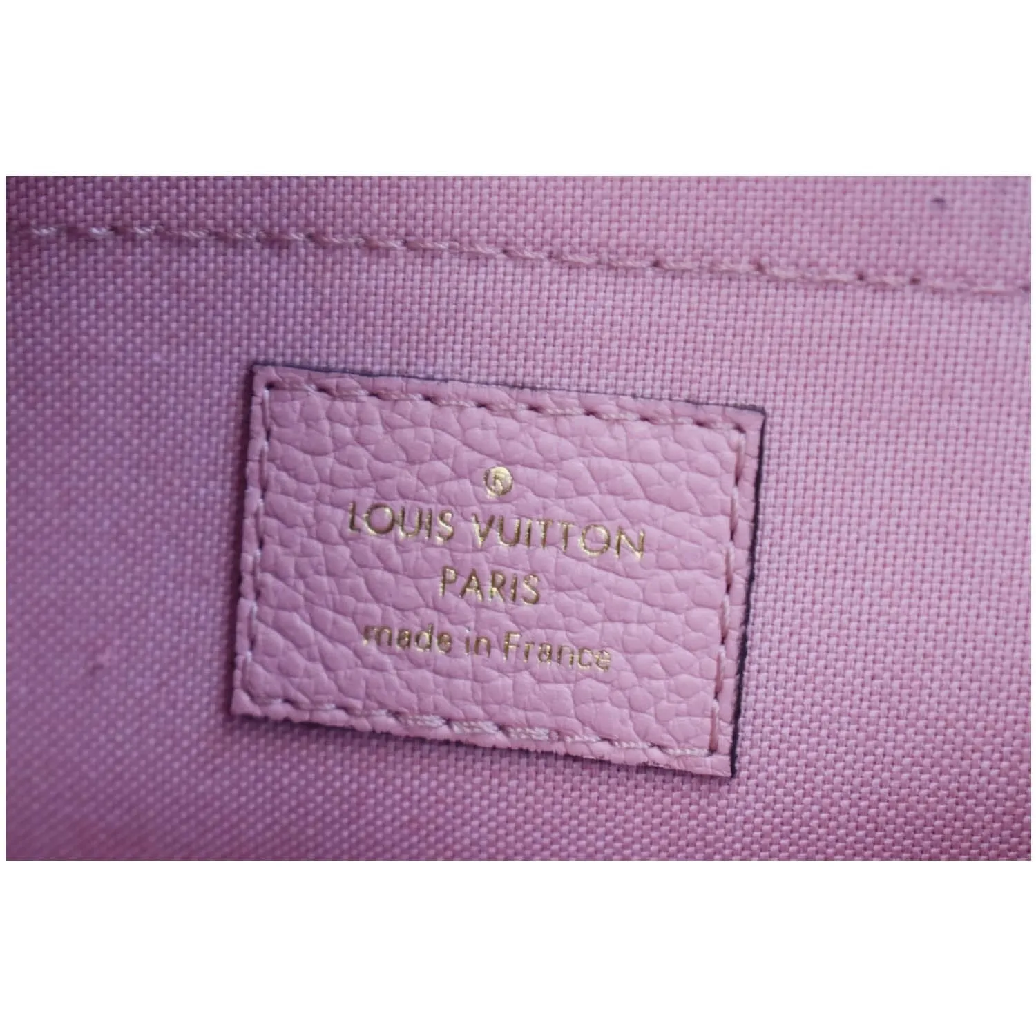 LOUIS VUITTON Daily Pouch Monogram Empreinte Leather Clutch Rose Poudre - 20% OFF