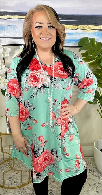 medium: Mint Flutter Tunic with coral floral print