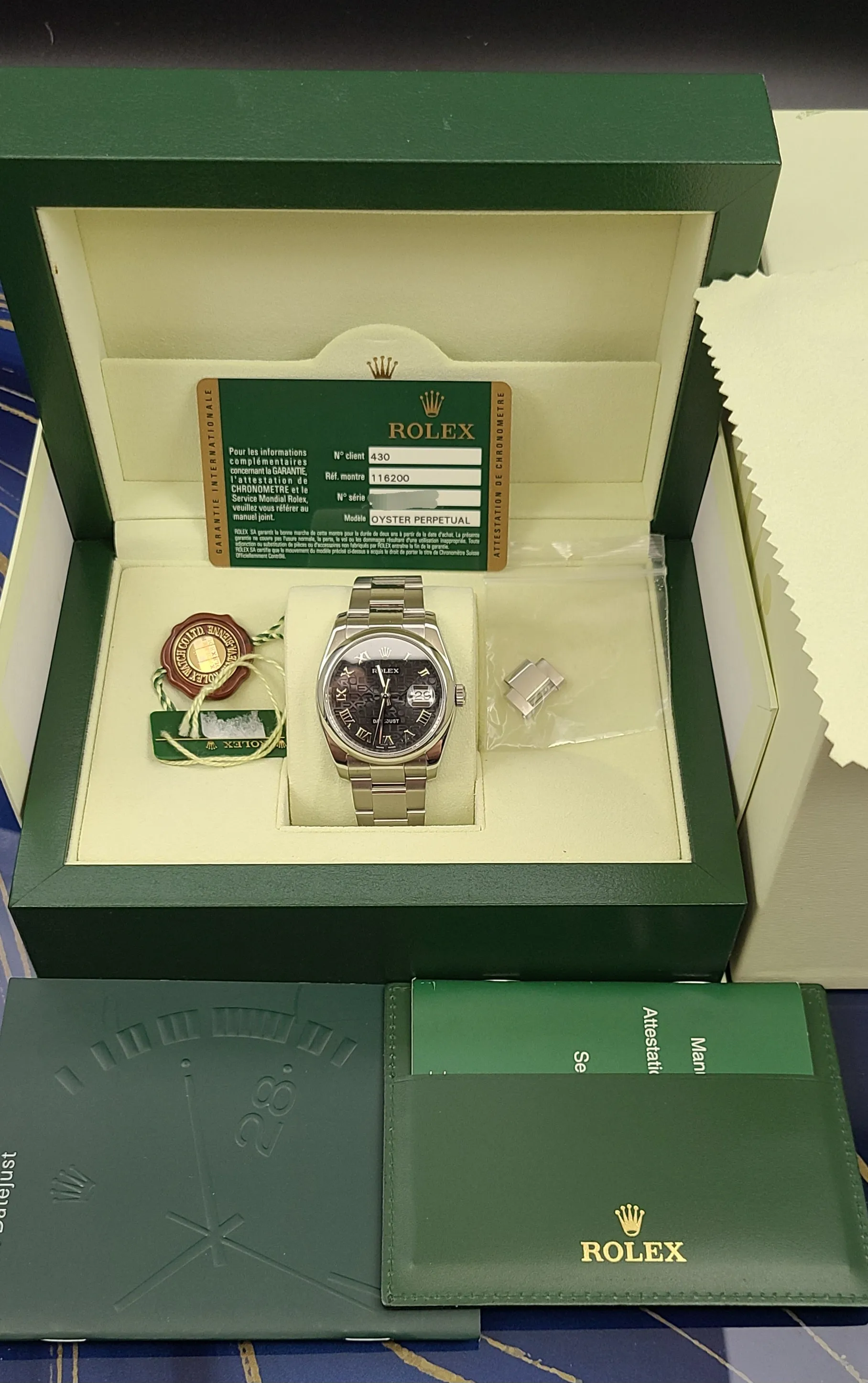 Rolex 116200 Black Roman Anniversary Dial Datejust