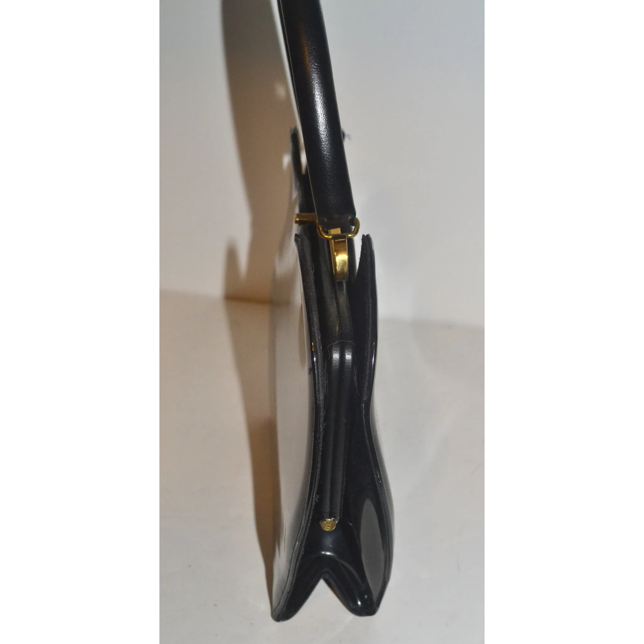 Sleek Black Patent Curved Purse