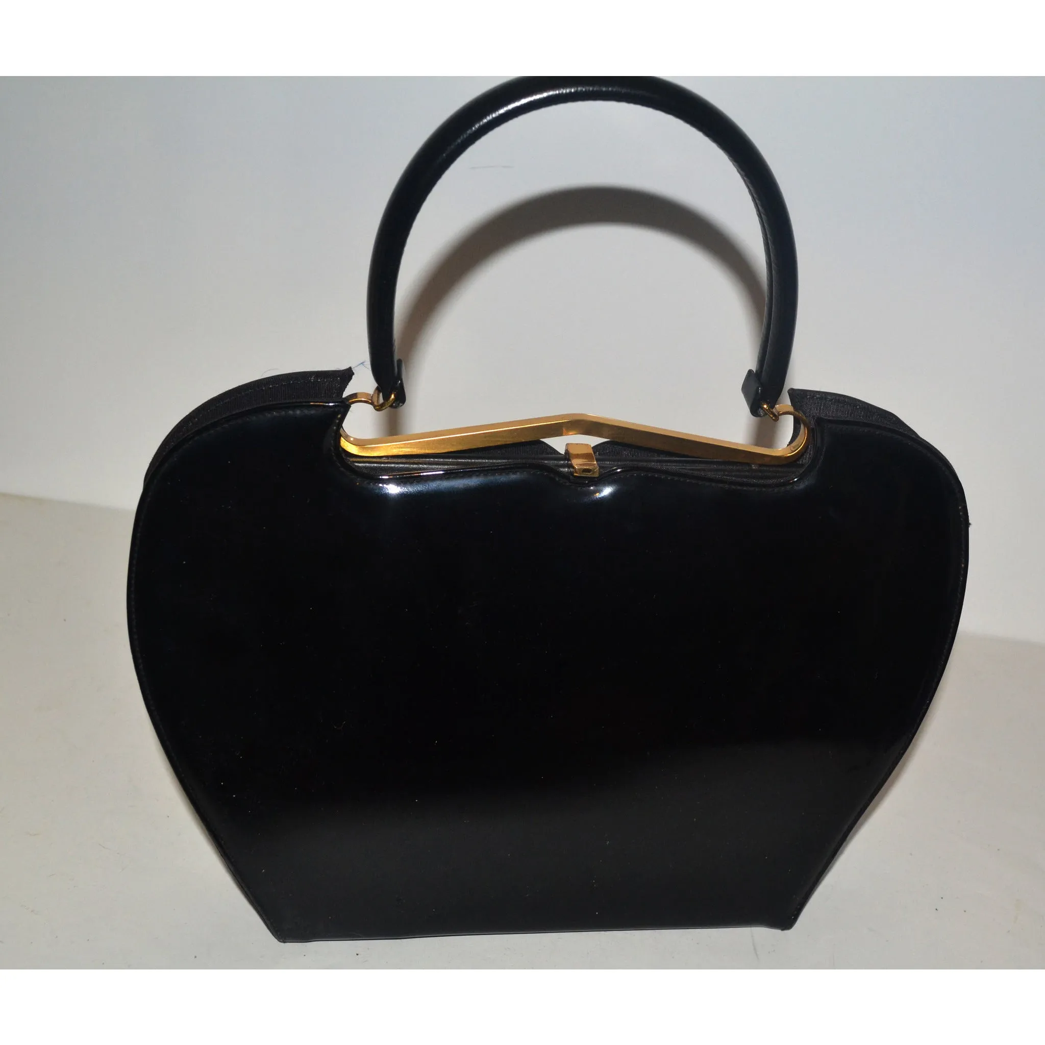 Sleek Black Patent Curved Purse