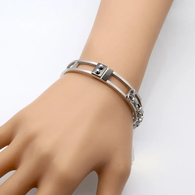 Sleek Street Punk Industrial Cuff Bracelet with two small rivets.
