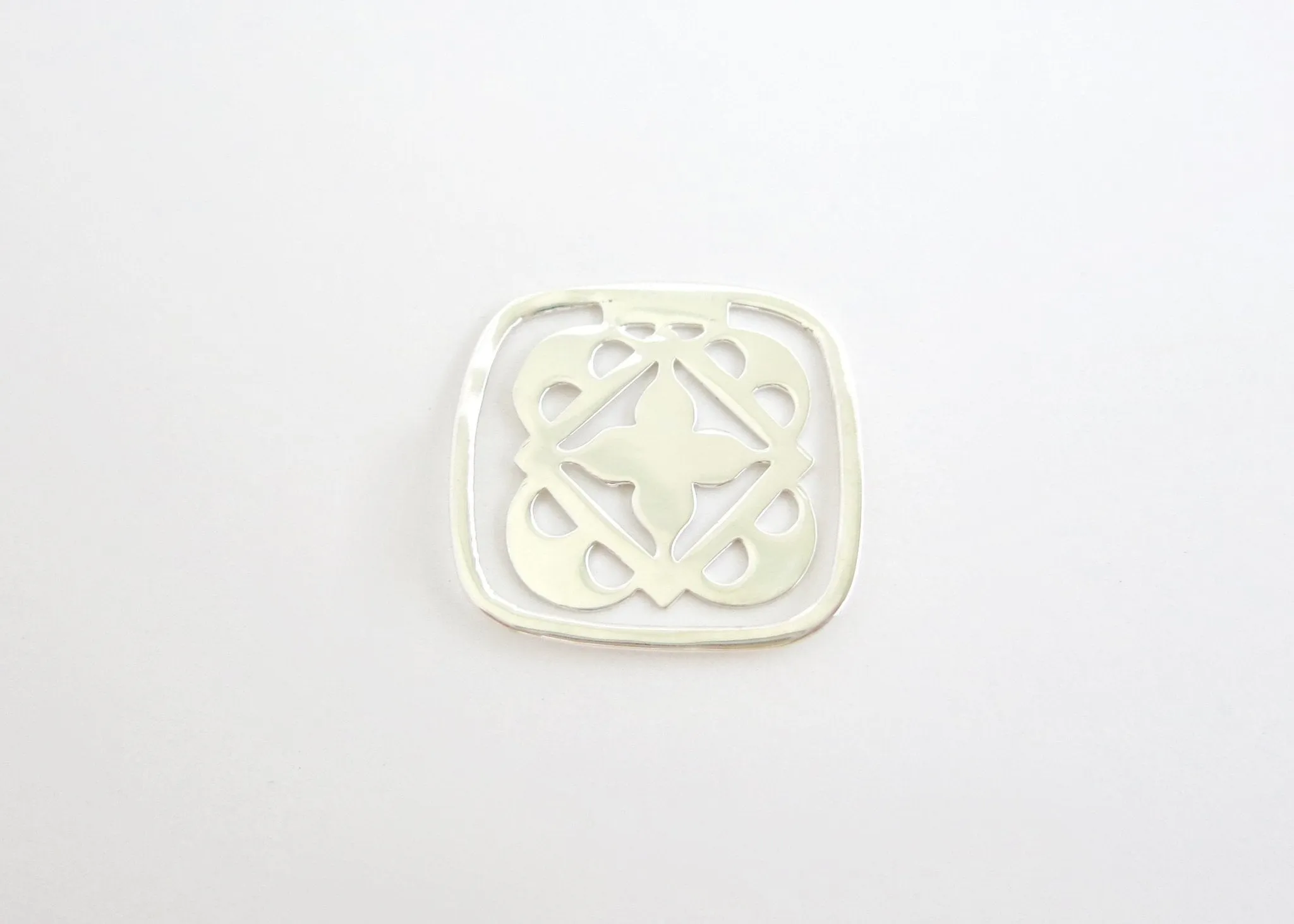 Small, rounded square, cutwork Bookmark