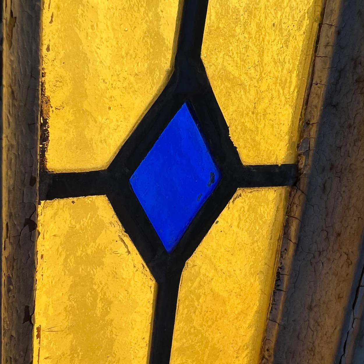 Tall Argentine Painted, Stained and Leaded Glass Steel Frame Arched Window