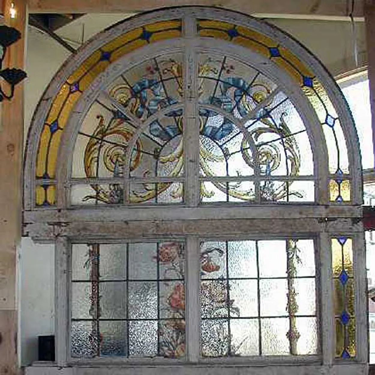 Tall Argentine Painted, Stained and Leaded Glass Steel Frame Arched Window