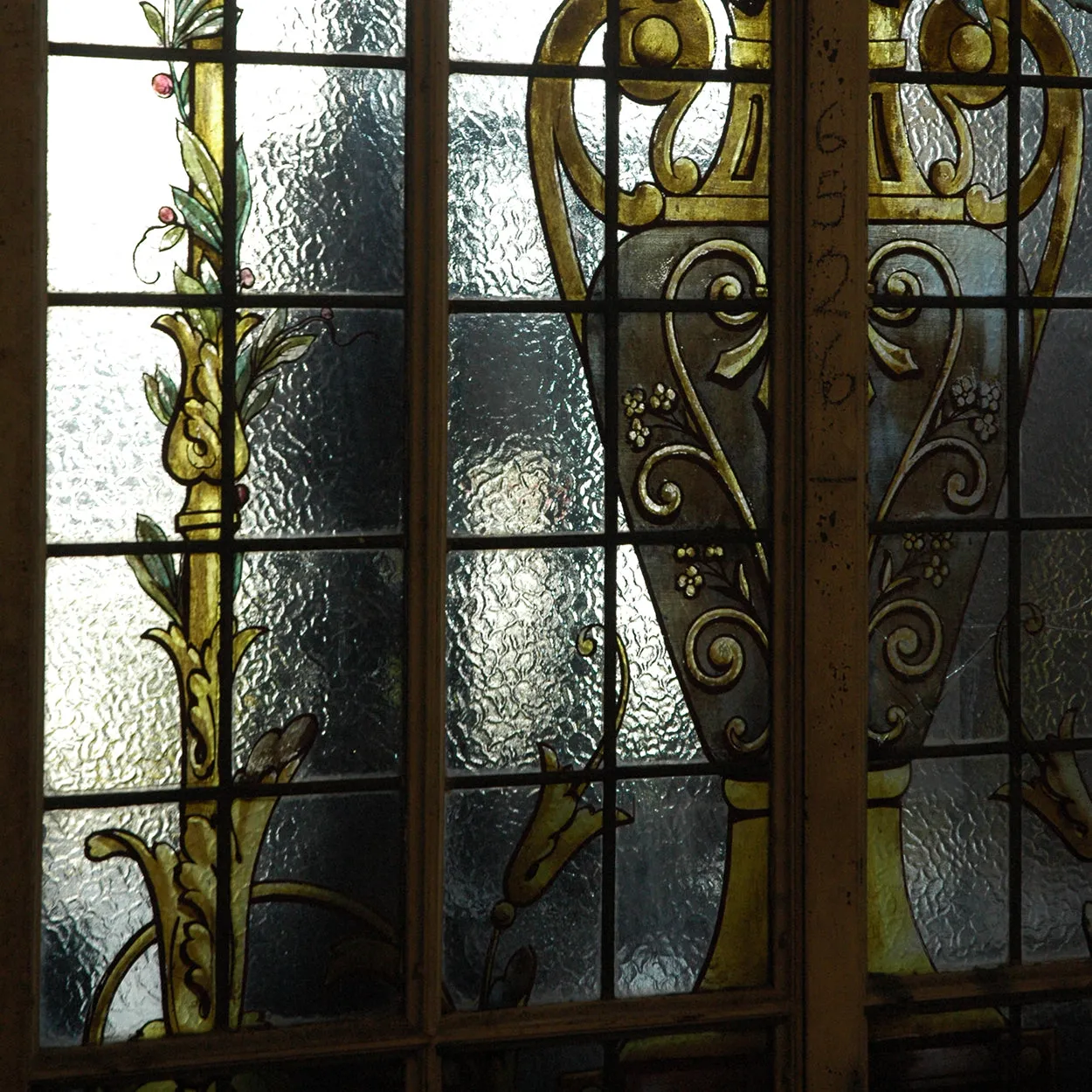 Tall Argentine Painted, Stained and Leaded Glass Steel Frame Arched Window